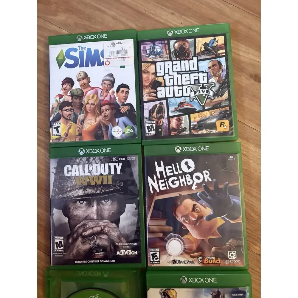 6 Xbox One games with a red wireless controller.